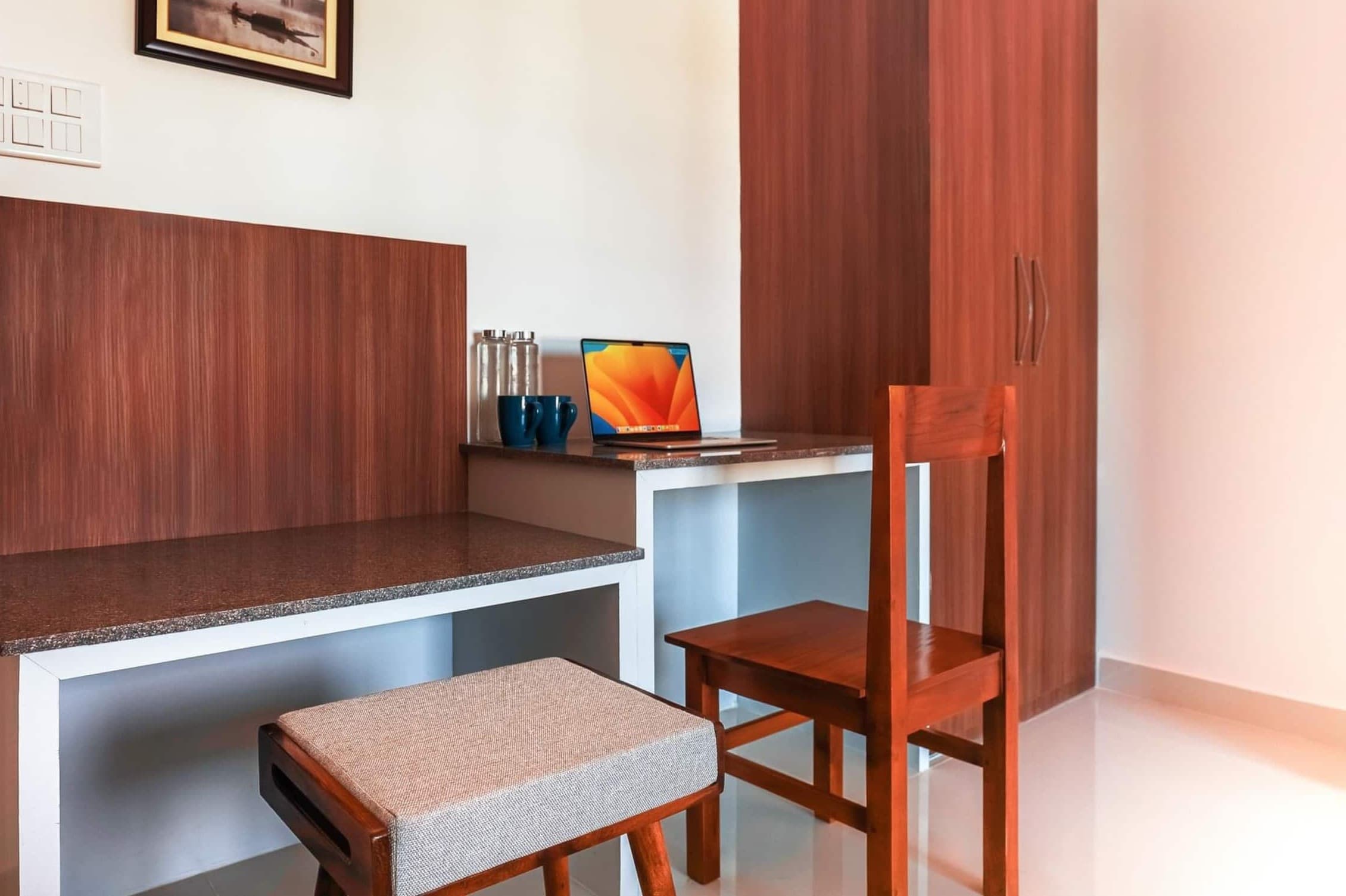 The dedicated workspace, with a laptop on the desk